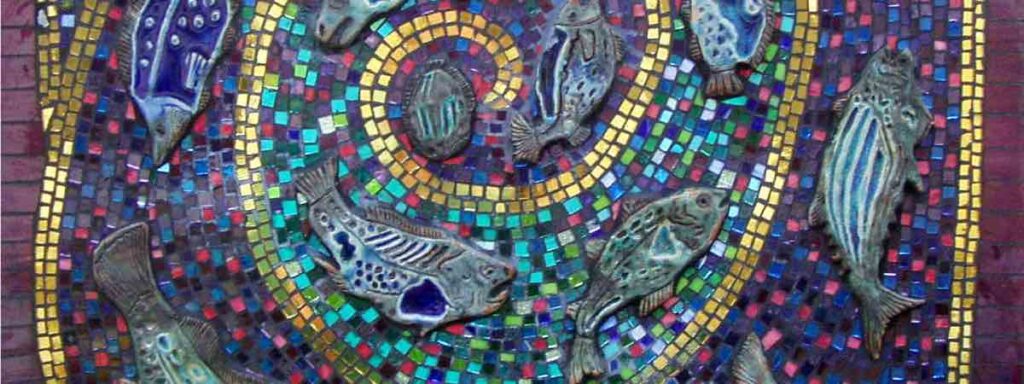 Stained glass and ceramic fish spiral